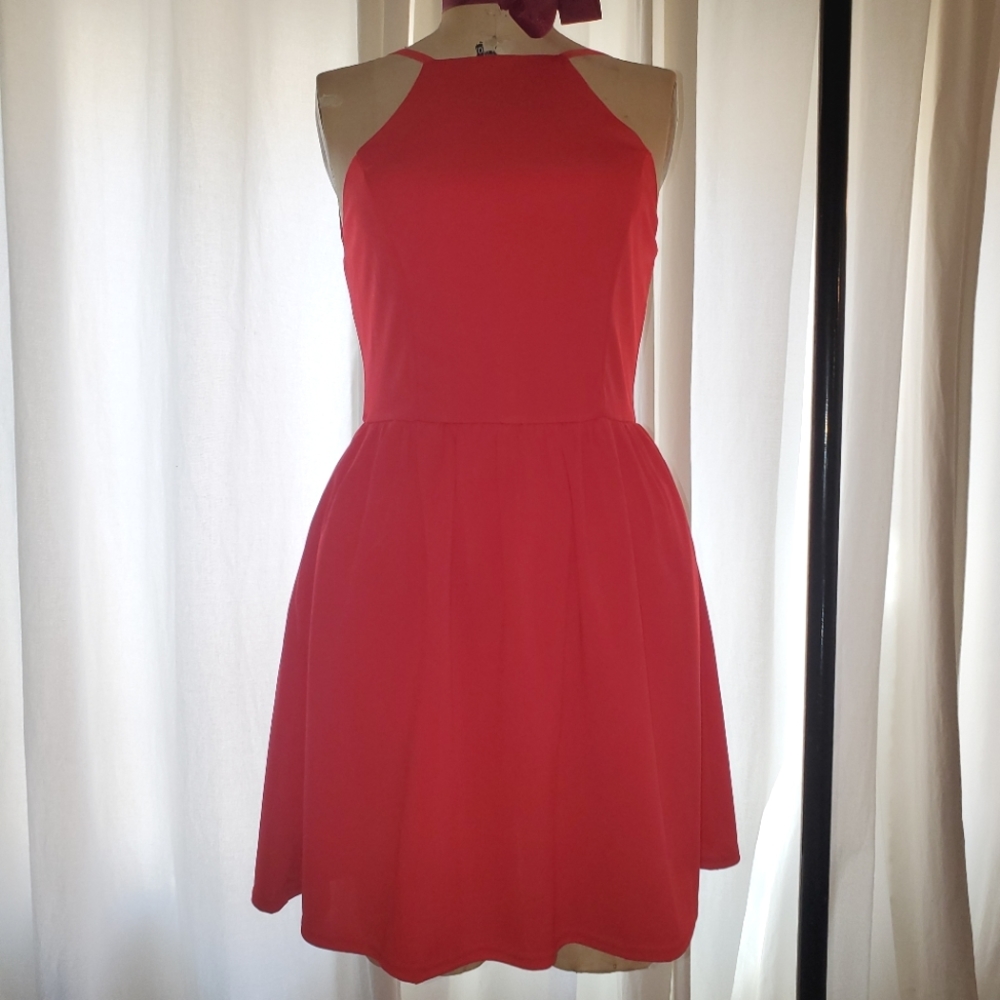 Fancyinn Medium red open-back skater dress.